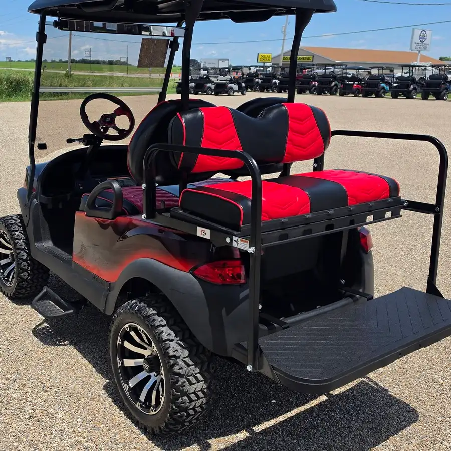 Rear three-quarter view of custom built red and black golf cart with flip seat and cargo bed – CSC Motor Company Springfield, IL
