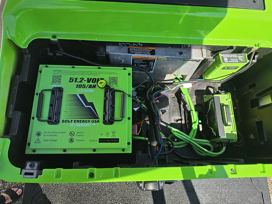 Green Bolt Energy lithium battery and wiring installed in lime green golf cart – CSC Motor Company Springfield, IL