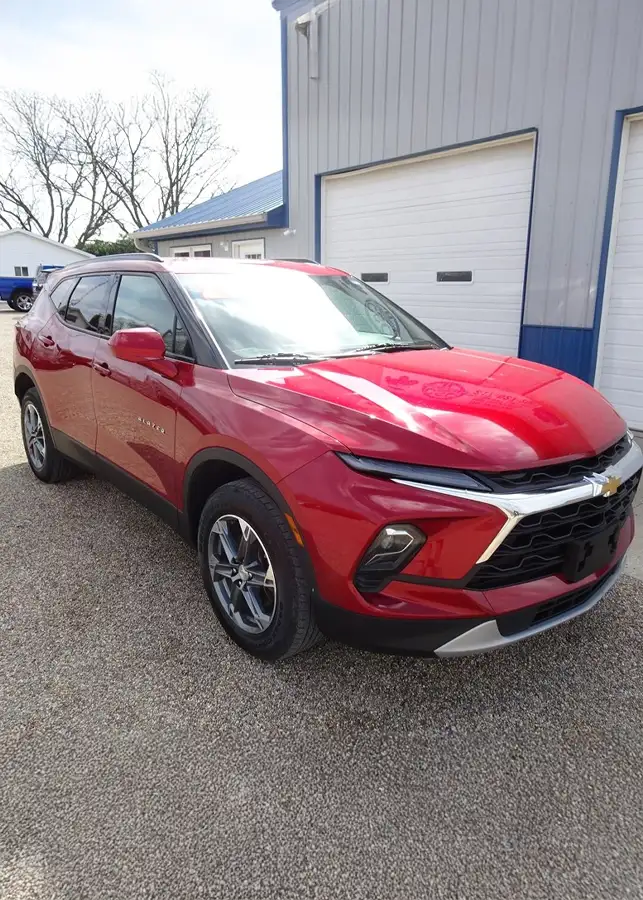 Pre-Owned Red Chevrolet Blazer SUV parked outside CSC Motor Company dealership near Springfield, IL