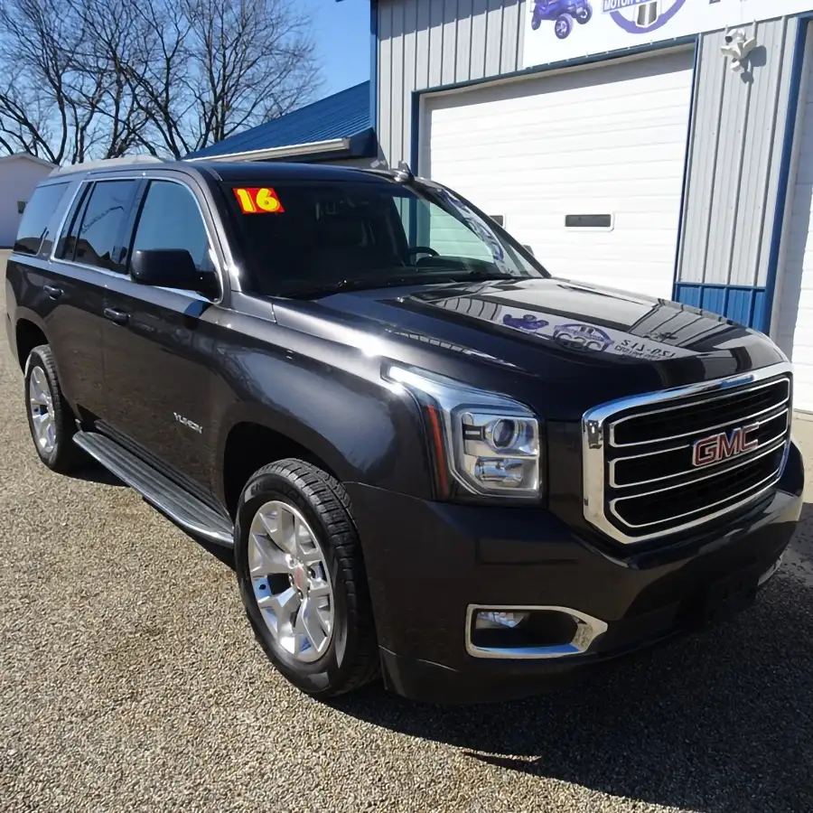 Gray GMC Yukon SUV parked outside CSC Motor Company dealership near Springfield, IL